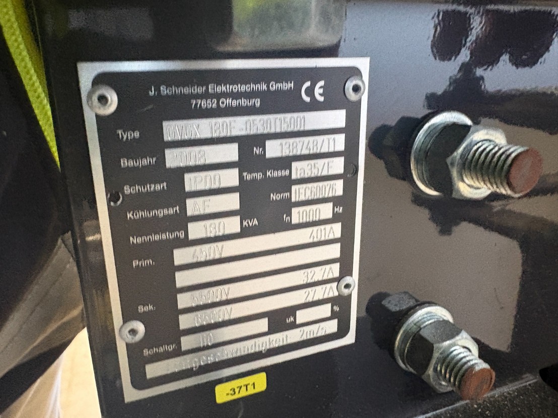 J. Schneider high-voltage transformer nameplate.