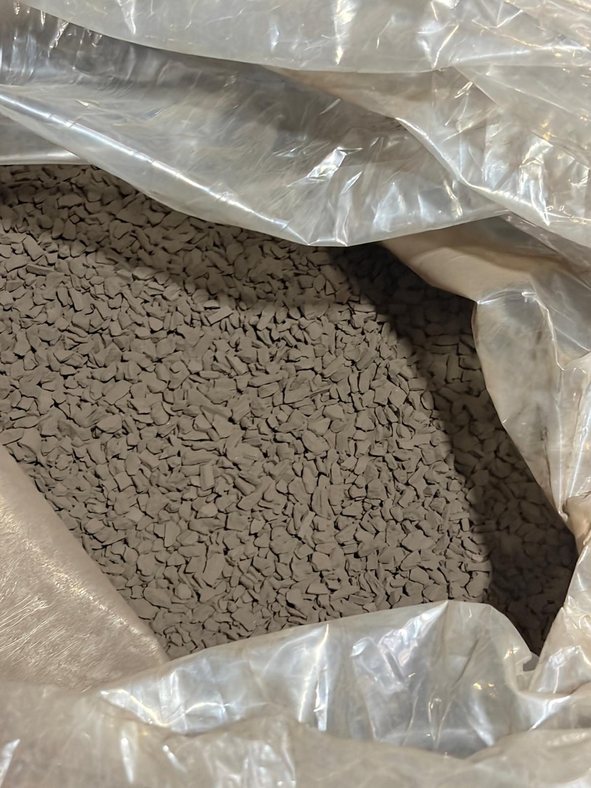 Ozone destruct catalyst media granules inside the sealed liner of a 20 kg drum