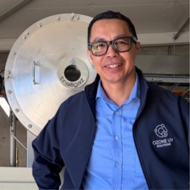 Jonathan Andry, Founder and Principal Engineer of Ozone UV Solutions Pty Ltd, beside an industrial ozone generator