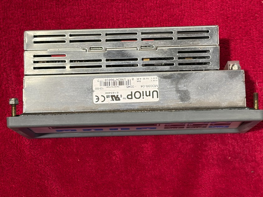 UniOP HMI rear and side view. Label indicates model MD03R-04, 24 VDC.