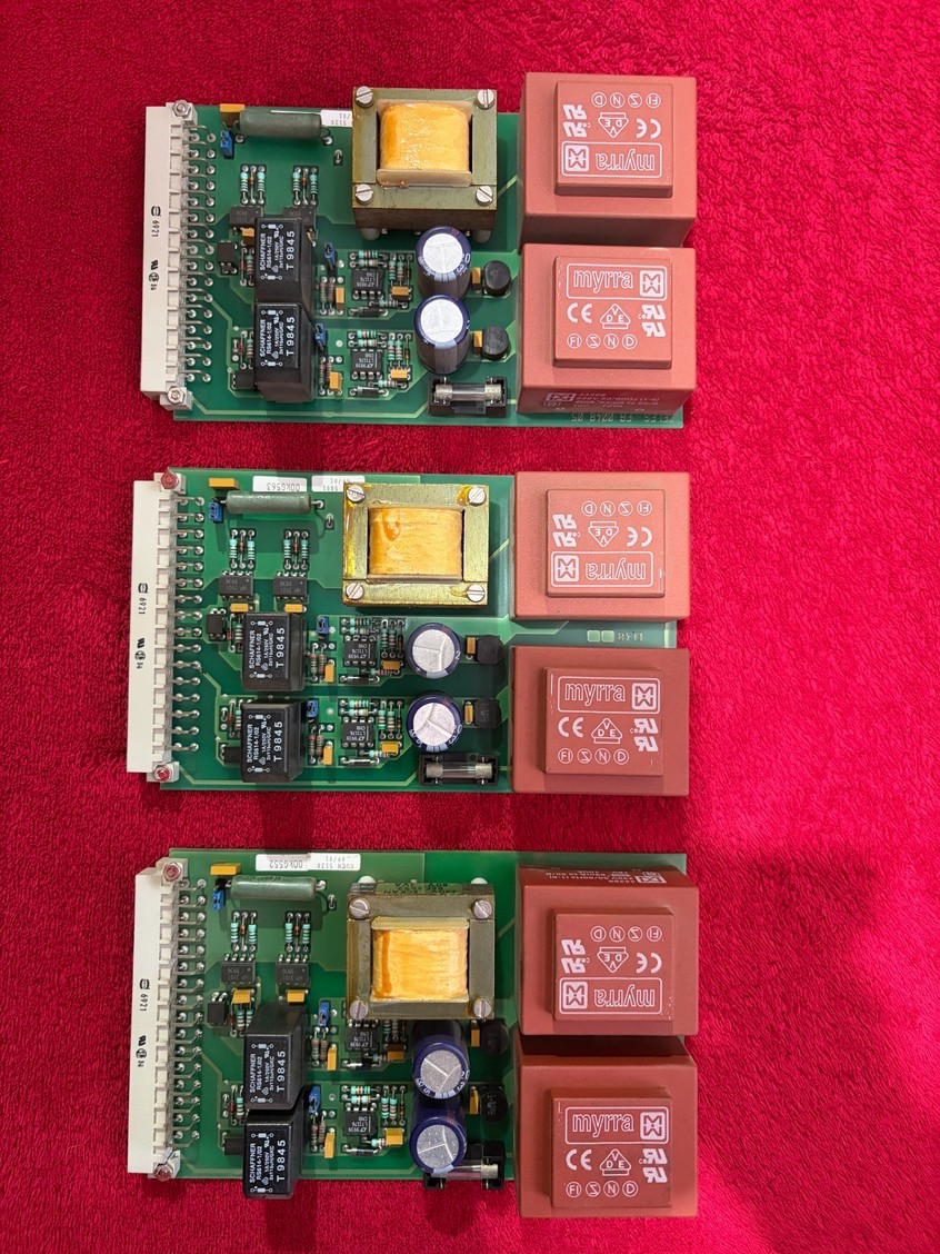 Three matching relay and transformer interface boards.