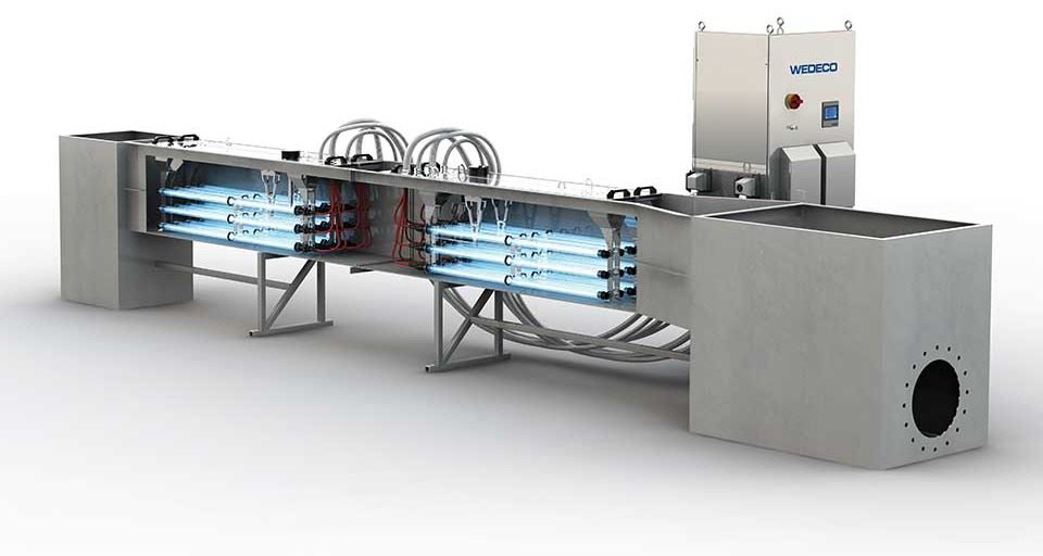 WEDECO TAK Smart packaged UV system in a stainless-steel channel with control cabinet
